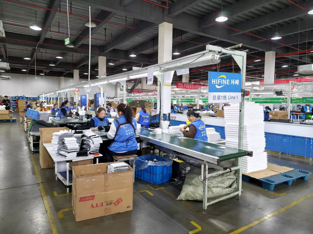 Employees are assembling HEPA filters